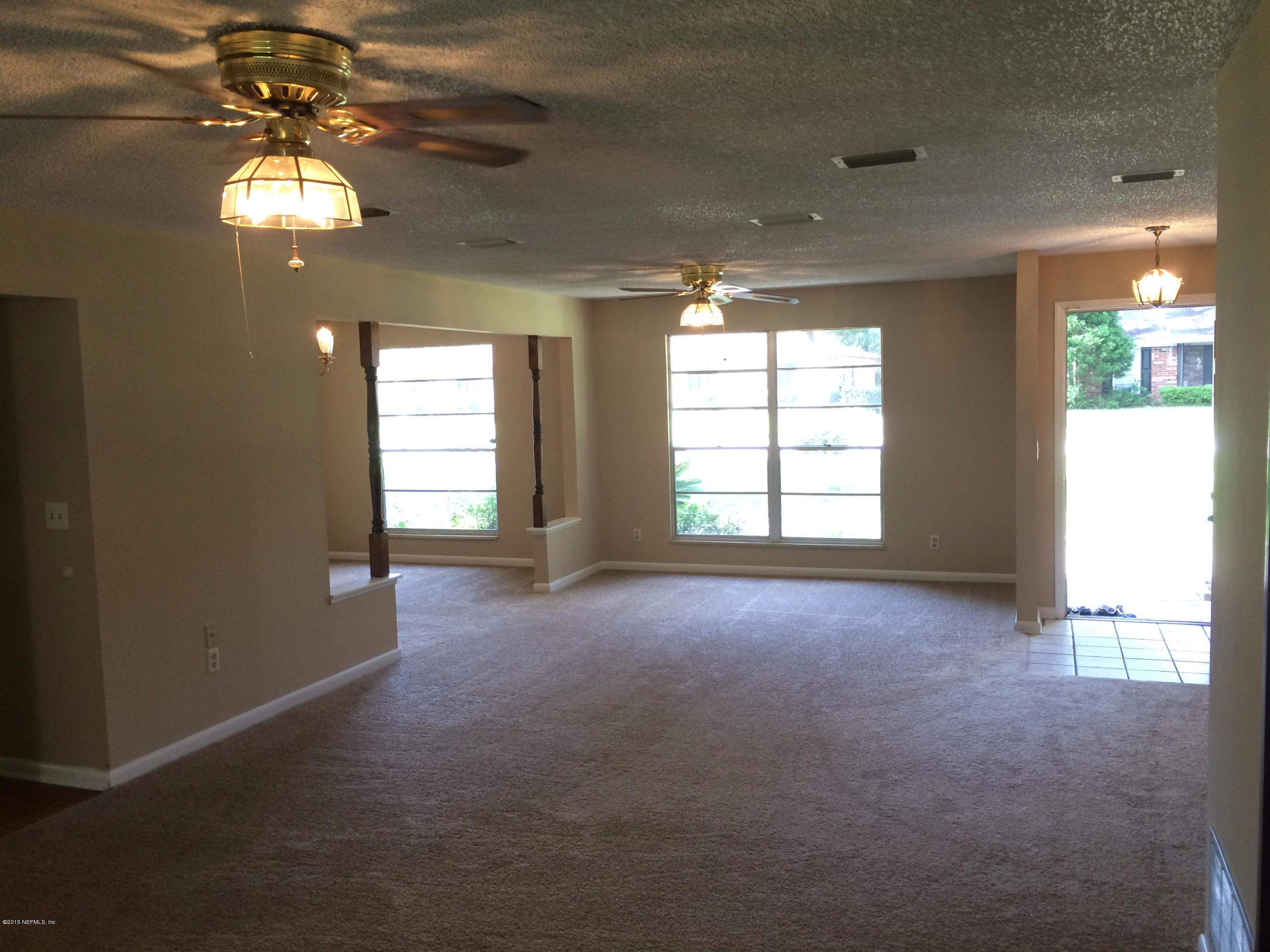 5471 Weaver Road Orange Park, FL 32073 - Photo 6 of 22 a view of empty room with window