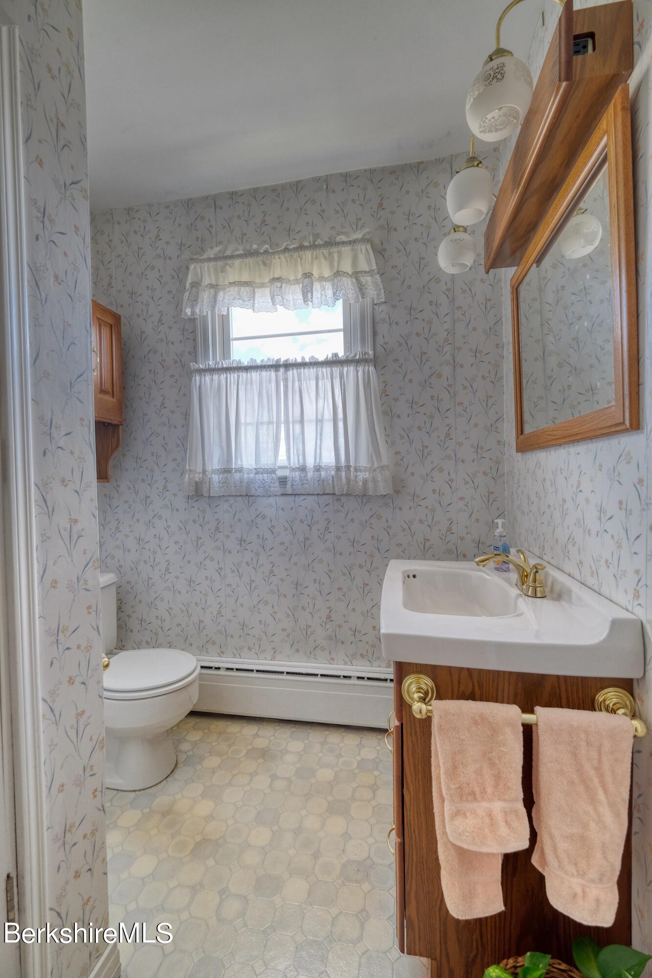237 Eleanor Road Pittsfield, MA 01201 - Photo 12 of 30 a bathroom with a sink and a toilet