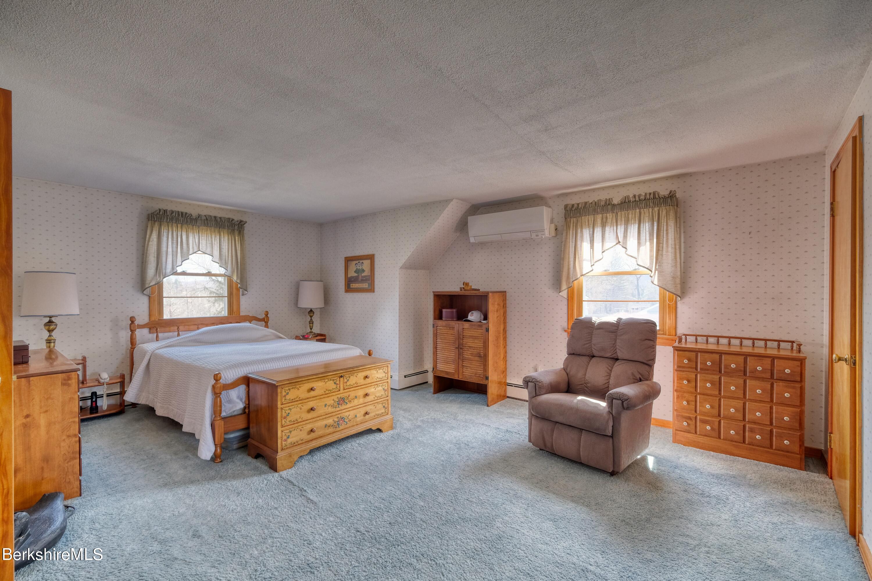 237 Eleanor Road Pittsfield, MA 01201 - Photo 15 of 30 a bedroom with furniture and a window