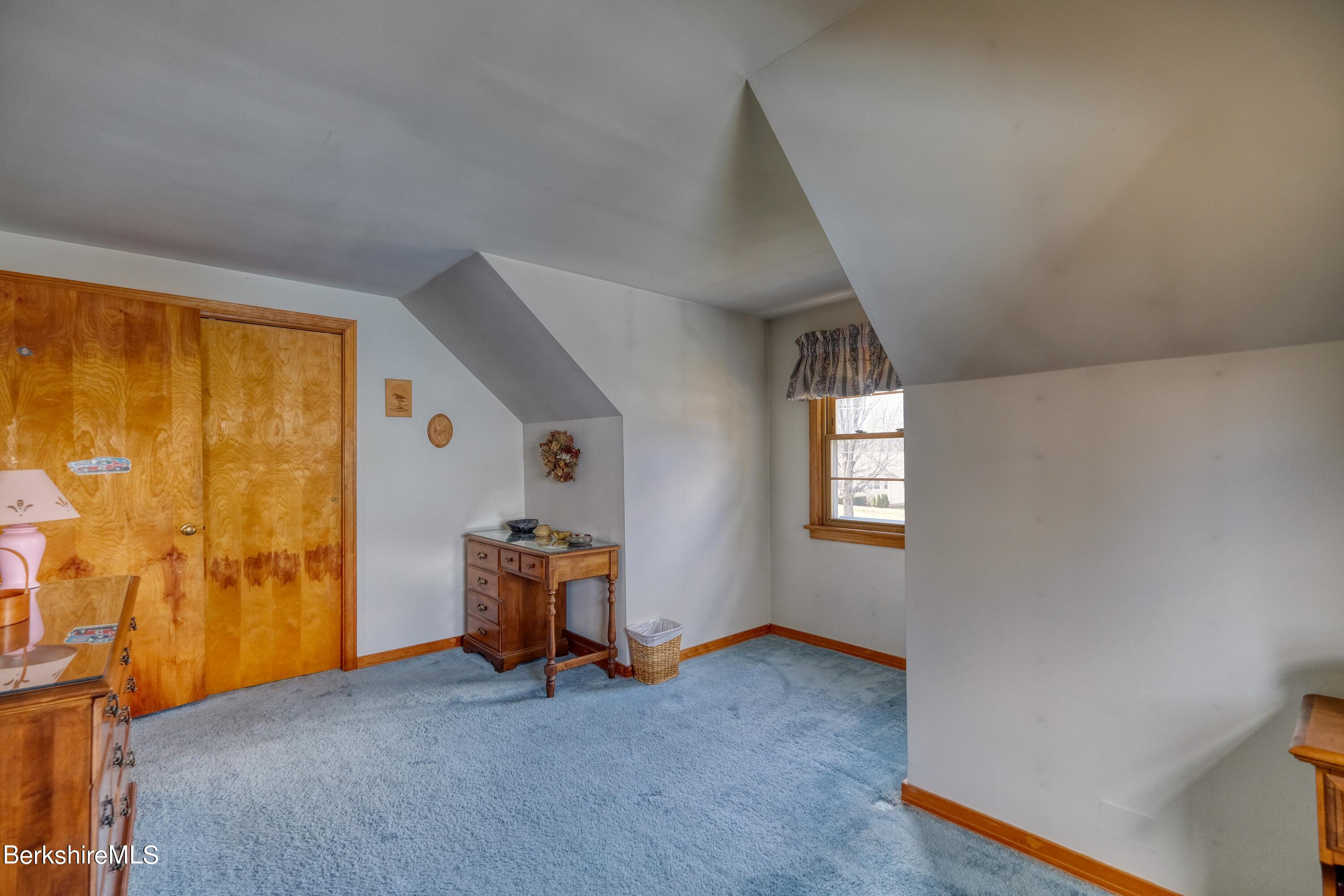 237 Eleanor Road Pittsfield, MA 01201 - Photo 21 of 30 a furnished livingroom with a window