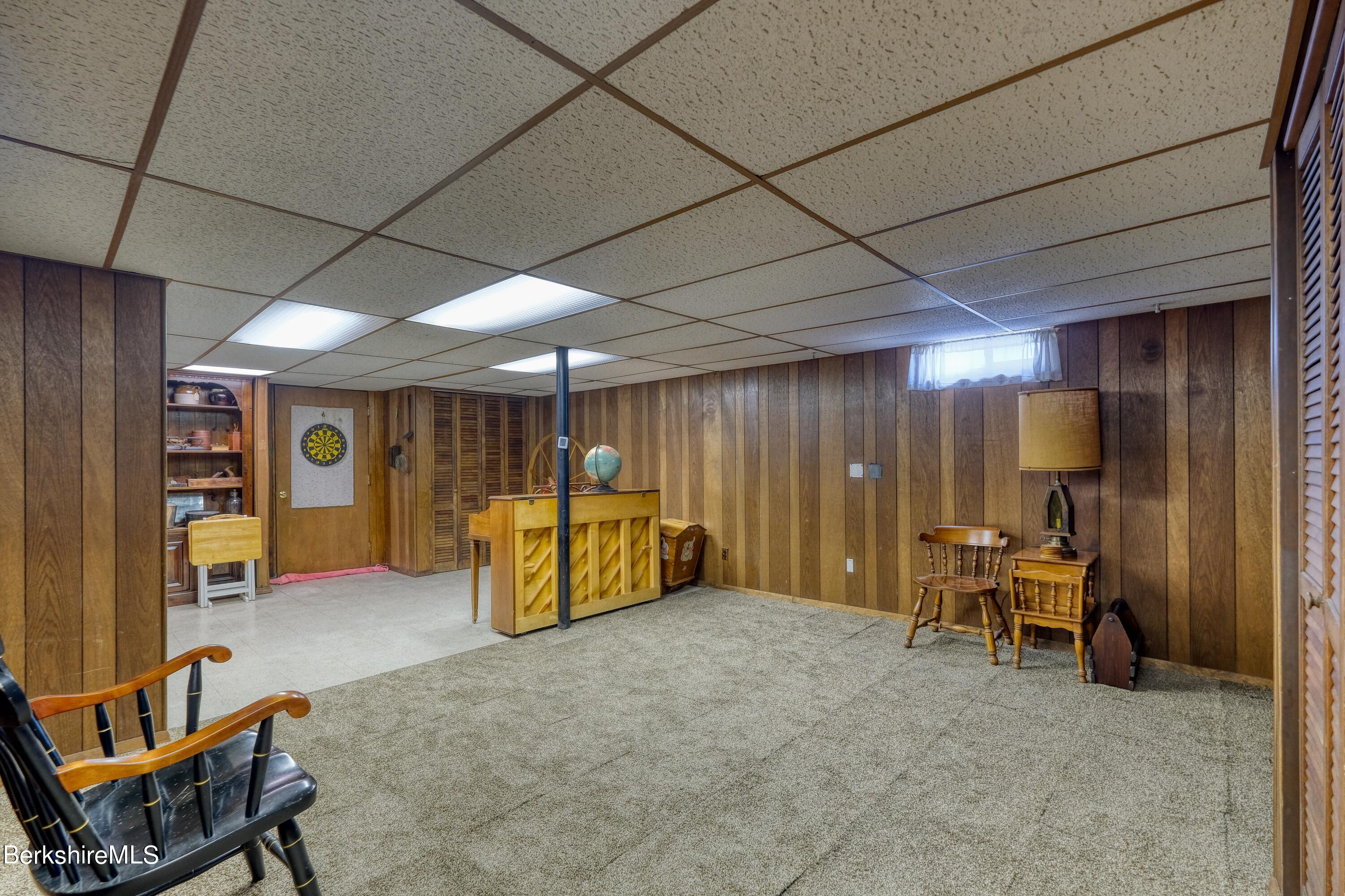 237 Eleanor Road Pittsfield, MA 01201 - Photo 23 of 30 a view of a livingroom with furniture and a fan