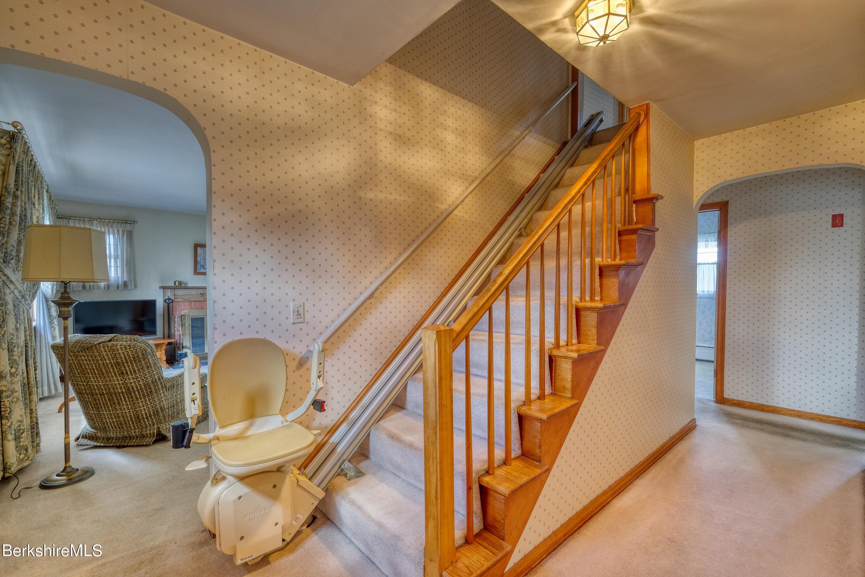 237 Eleanor Road Pittsfield, MA 01201 - Photo 6 of 30 a view of entryway and hall with wooden floor