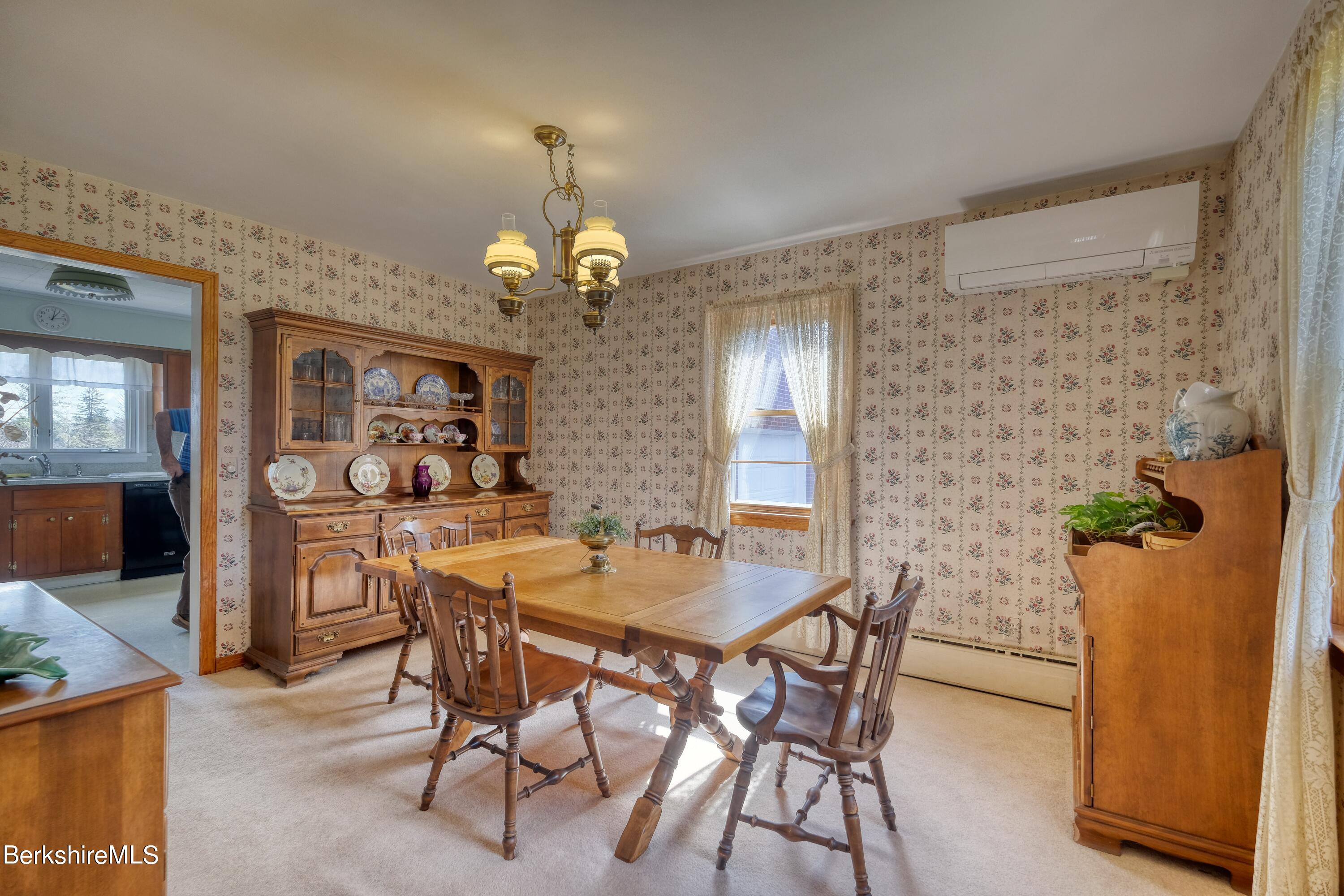 237 Eleanor Road Pittsfield, MA 01201 - Photo 7 of 30 a view of a dining room with furniture and chandelier