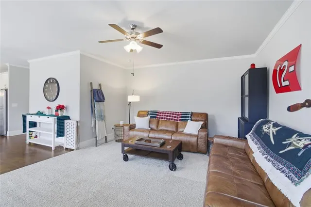 a bedroom with furniture and windows