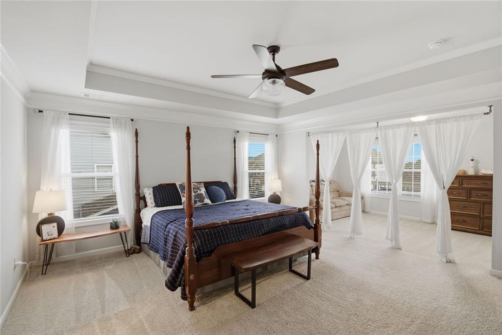 619 Little Bear Loop Canton, GA 30114 - Photo 20 of 39 a bedroom with furniture and windows