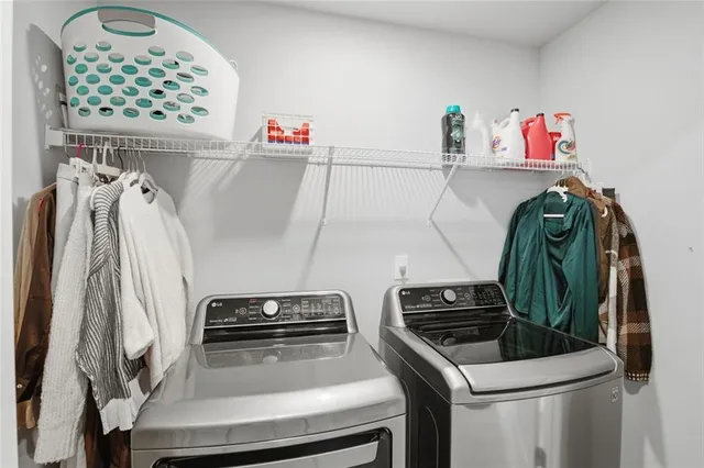 a bathroom with a toilet a sink and a mirror