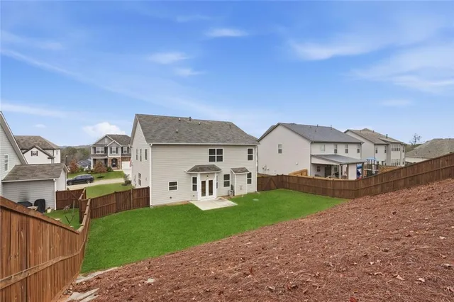 a view of a backyard with plants