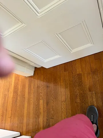 a bedroom with a bed and a shower curtain