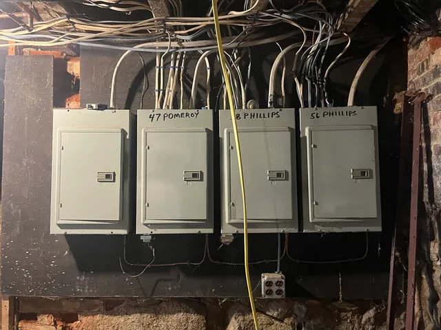 a view of walk in closet with clothes