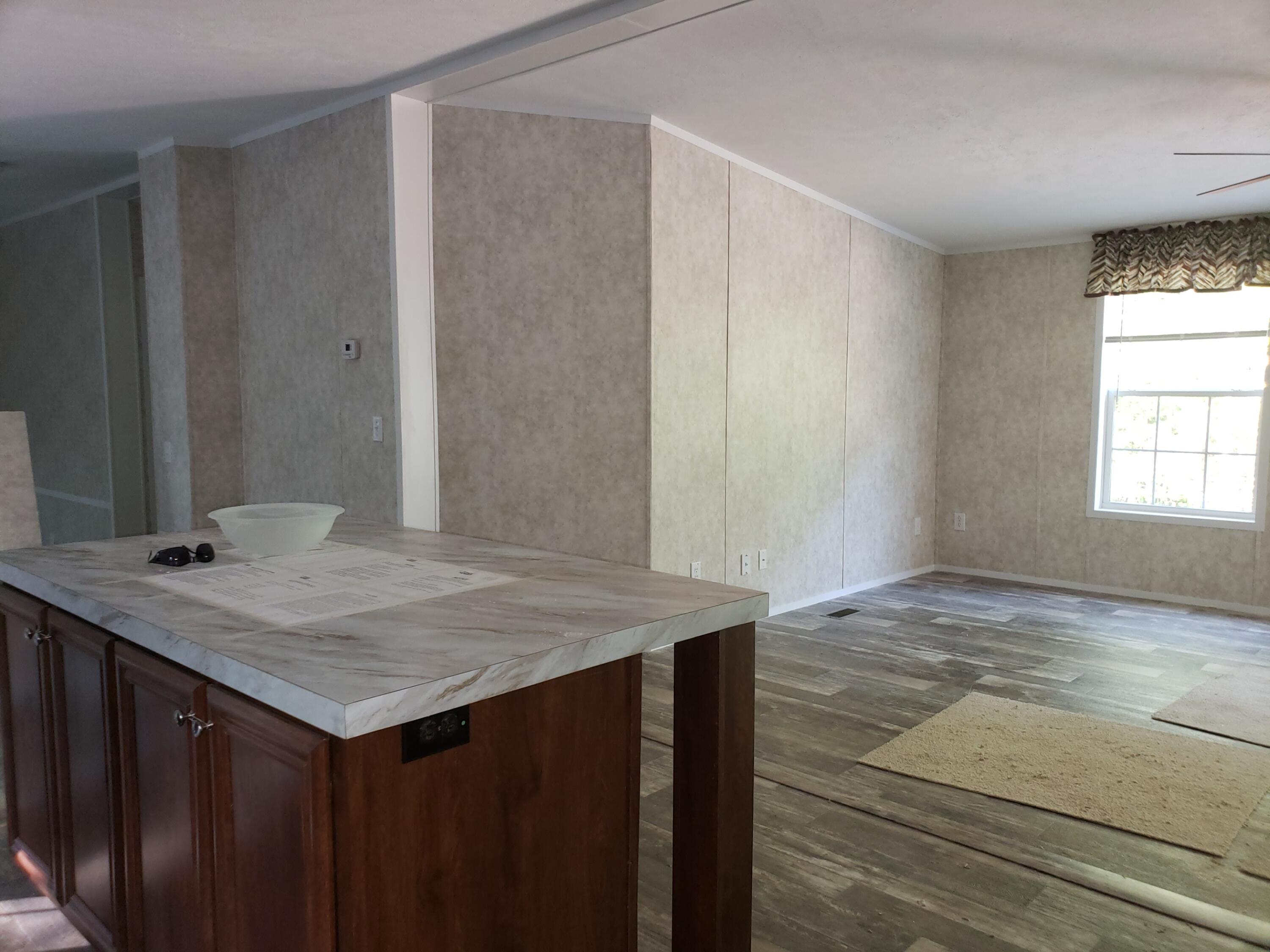 0 Passaconaway Road Waterford, ME 04088 - Photo 9 of 25 kitchen to living rm.