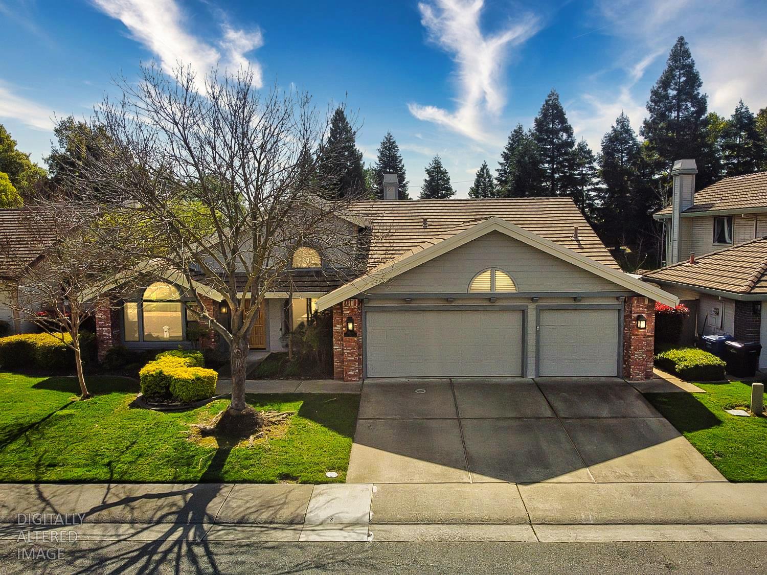 11864 South Carson Way Gold River, CA 95670 - Photo 1 of 69 a view of a white house with a yard and potted plants