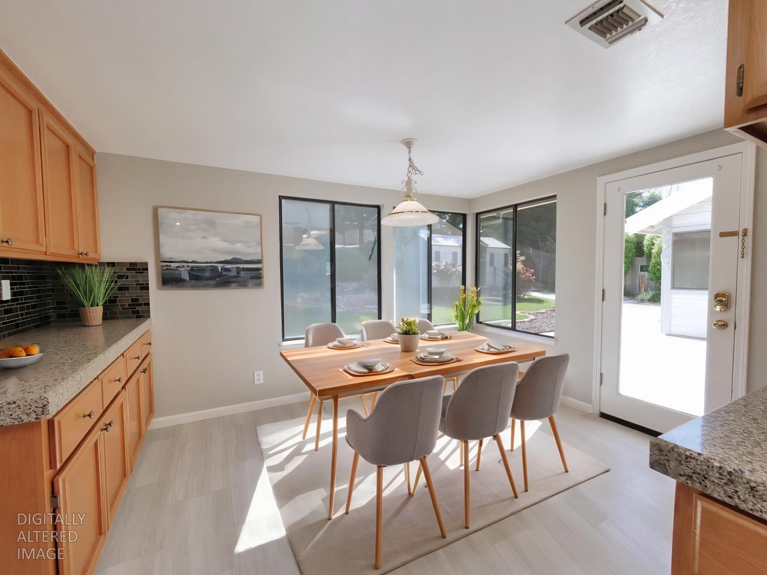 11864 South Carson Way Gold River, CA 95670 - Photo 35 of 69 a view of a dining room with furniture and wooden floor