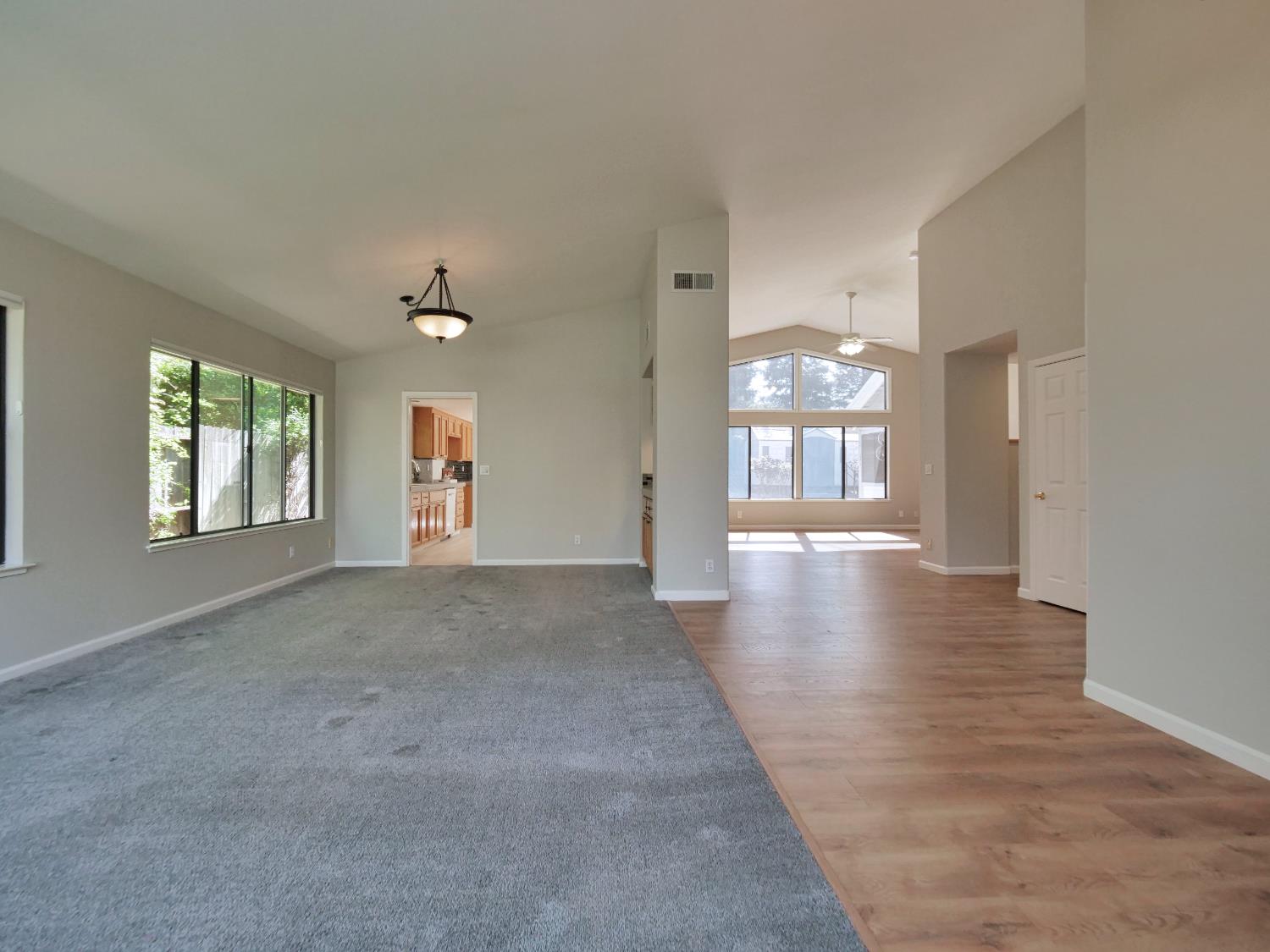 11864 South Carson Way Gold River, CA 95670 - Photo 37 of 69 a view of a big room with windows and chandelier
