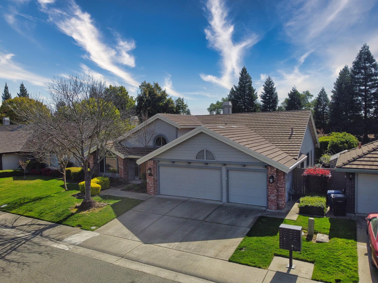 11864 South Carson Way Gold River, CA 95670 - Photo 5 of 69 a front view of a house with garden