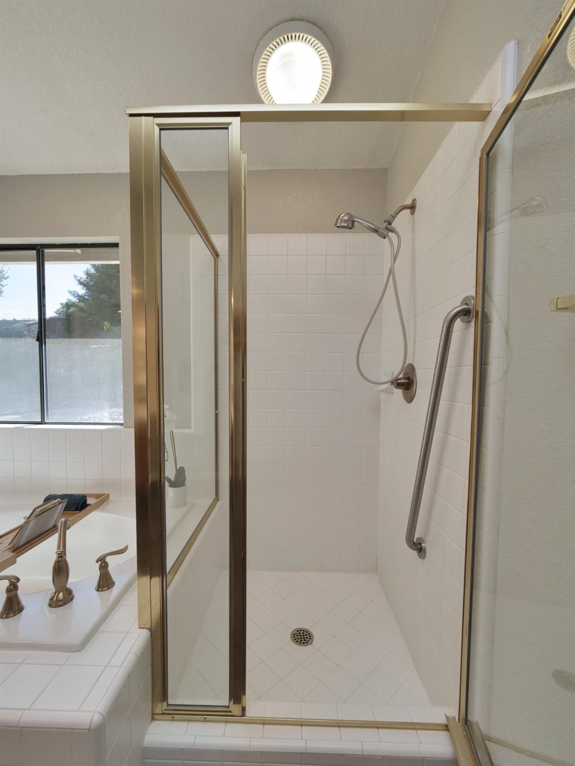11864 South Carson Way Gold River, CA 95670 - Photo 59 of 69 a bathroom with a shower