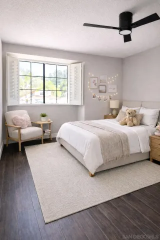 a bedroom with a bed and a couch