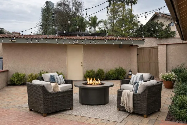 a couple of potted plants in front of door