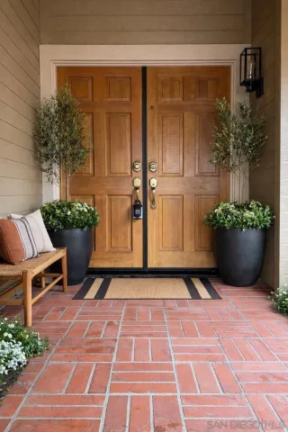 an aerial view of a house with a ocean view