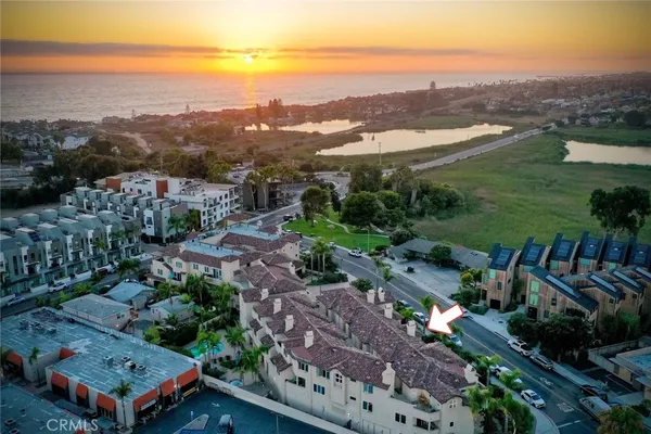 a view of a street with a lake view