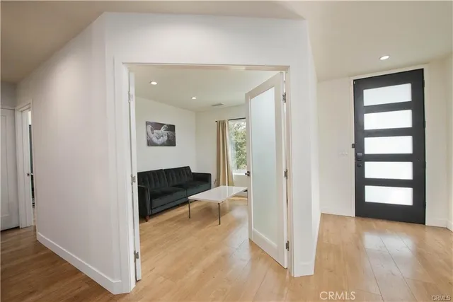 wooden floor in an empty room and a window