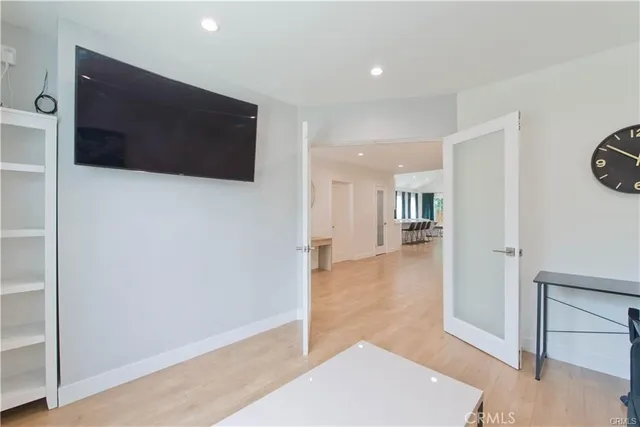 a view of a livingroom with wooden floor