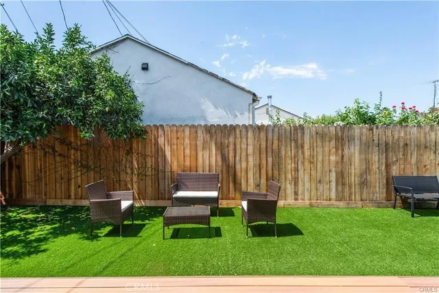 a garden view with a seating space