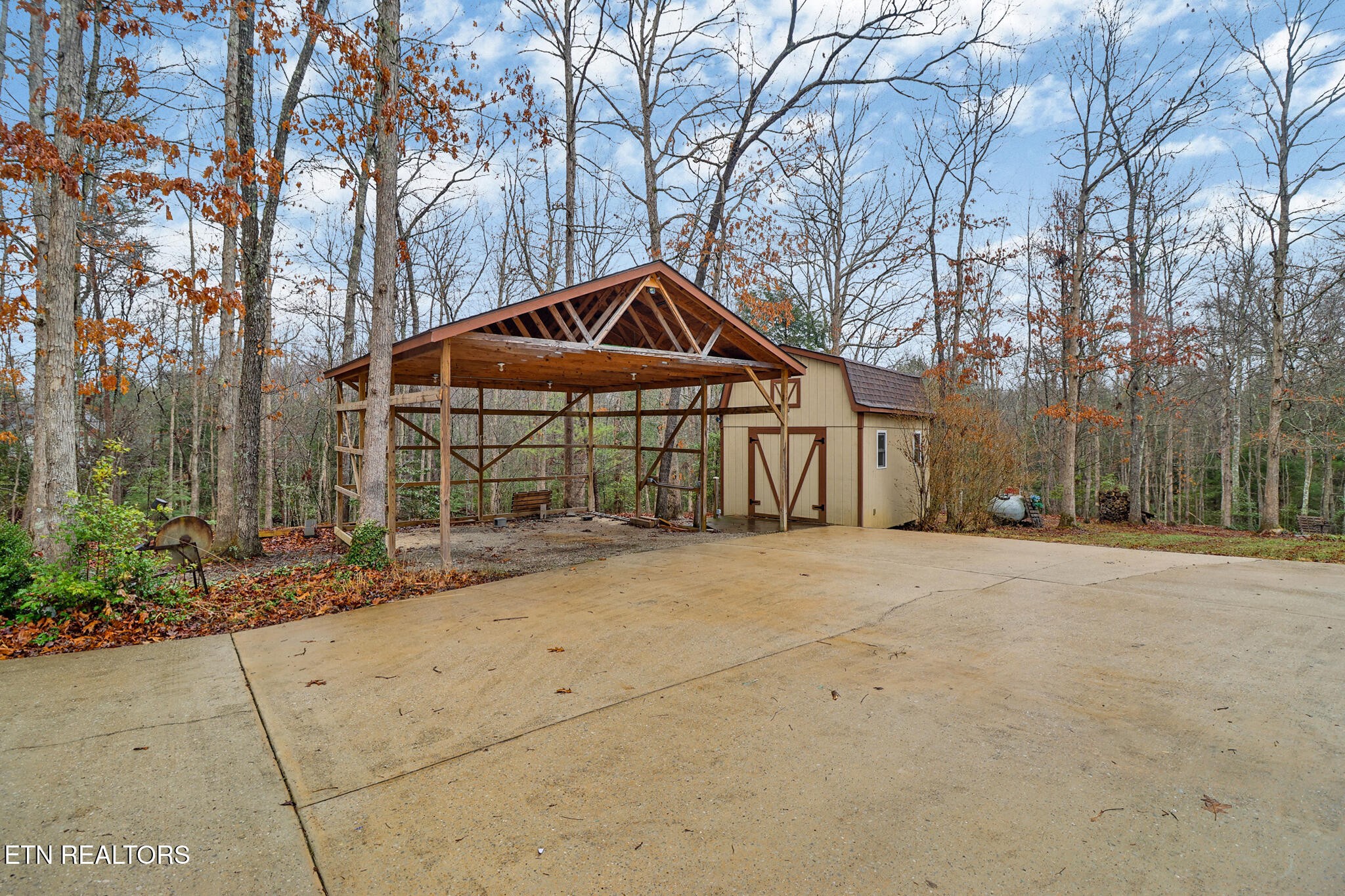 224 Victoria Circle Jamestown, TN 38556 - Photo 11 of 52 a front view of a house with a yard and trees