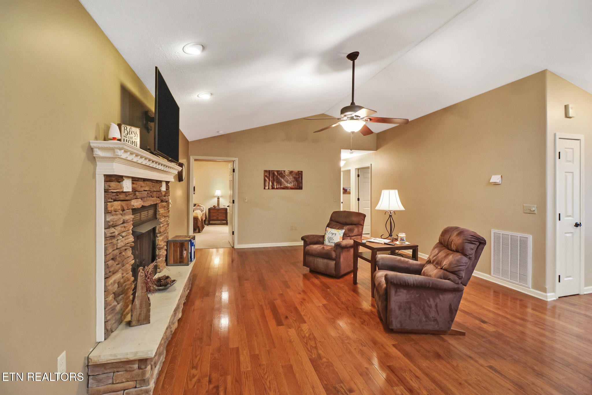 224 Victoria Circle Jamestown, TN 38556 - Photo 23 of 52 a living room with furniture and a wooden floor