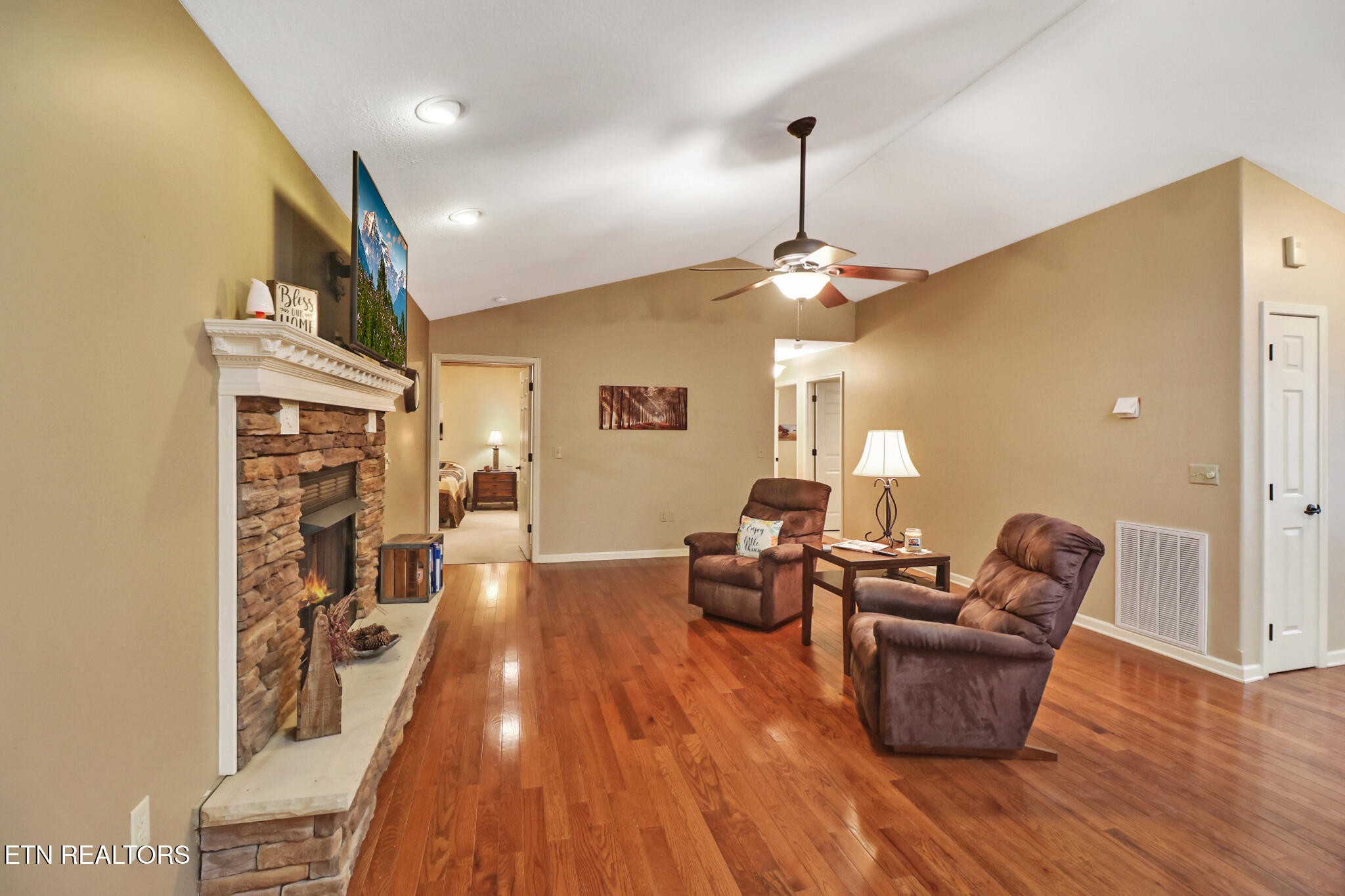 224 Victoria Circle Jamestown, TN 38556 - Photo 24 of 52 a living room with furniture and a wooden floor