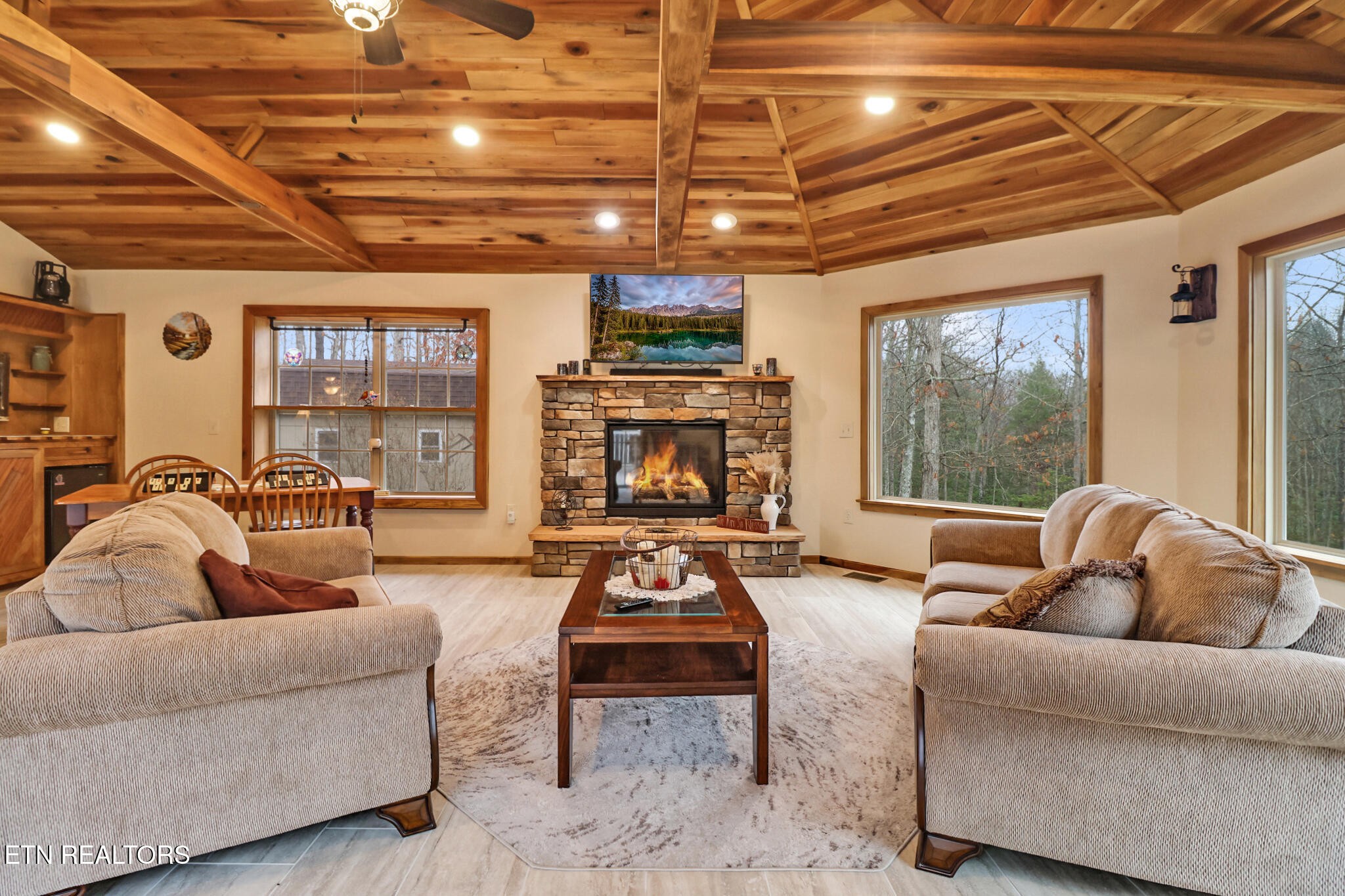224 Victoria Circle Jamestown, TN 38556 - Photo 36 of 52 a living room with furniture kitchen view and a large window
