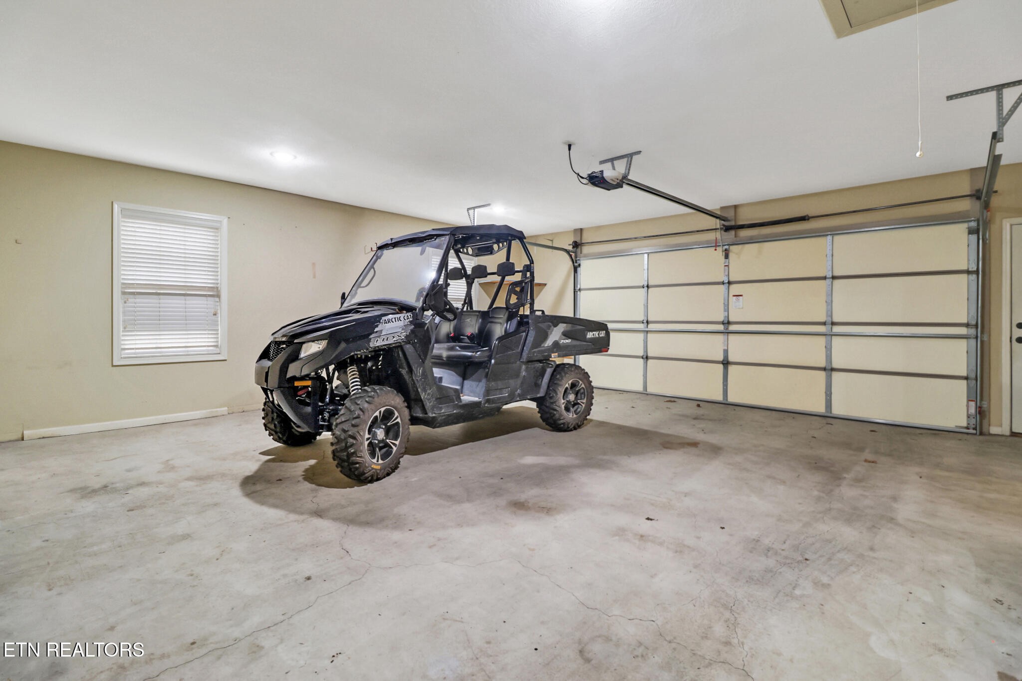 224 Victoria Circle Jamestown, TN 38556 - Photo 52 of 52 a view of a garage with parked cars