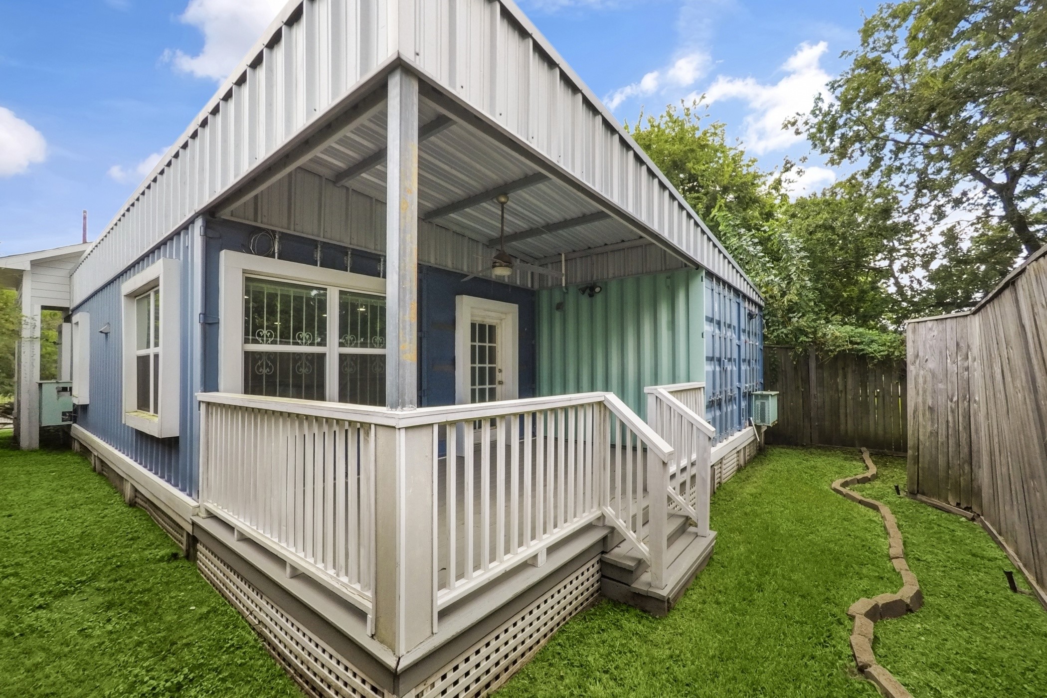 1709 Dan Street Houston, TX 77020 - Photo 27 of 29 a view of a house with a yard and deck