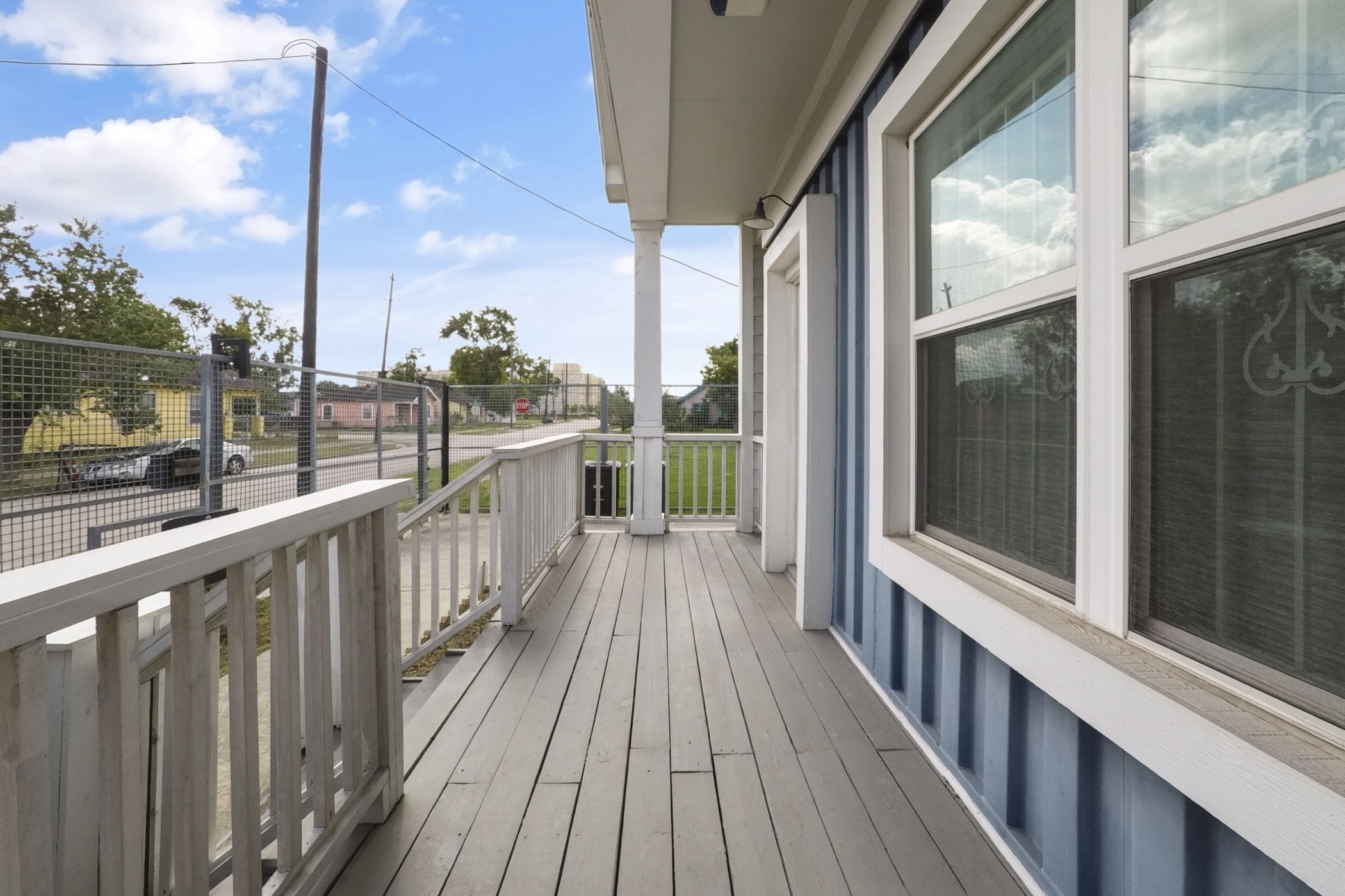 1709 Dan Street Houston, TX 77020 - Photo 7 of 29 a view of a balcony with wooden floor