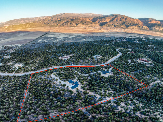 6688 Bareback Road Cedar City, UT 84720 - Photo 3 of 58 Aerial view of property and surrounding area featuring property parcel outlined and mountains