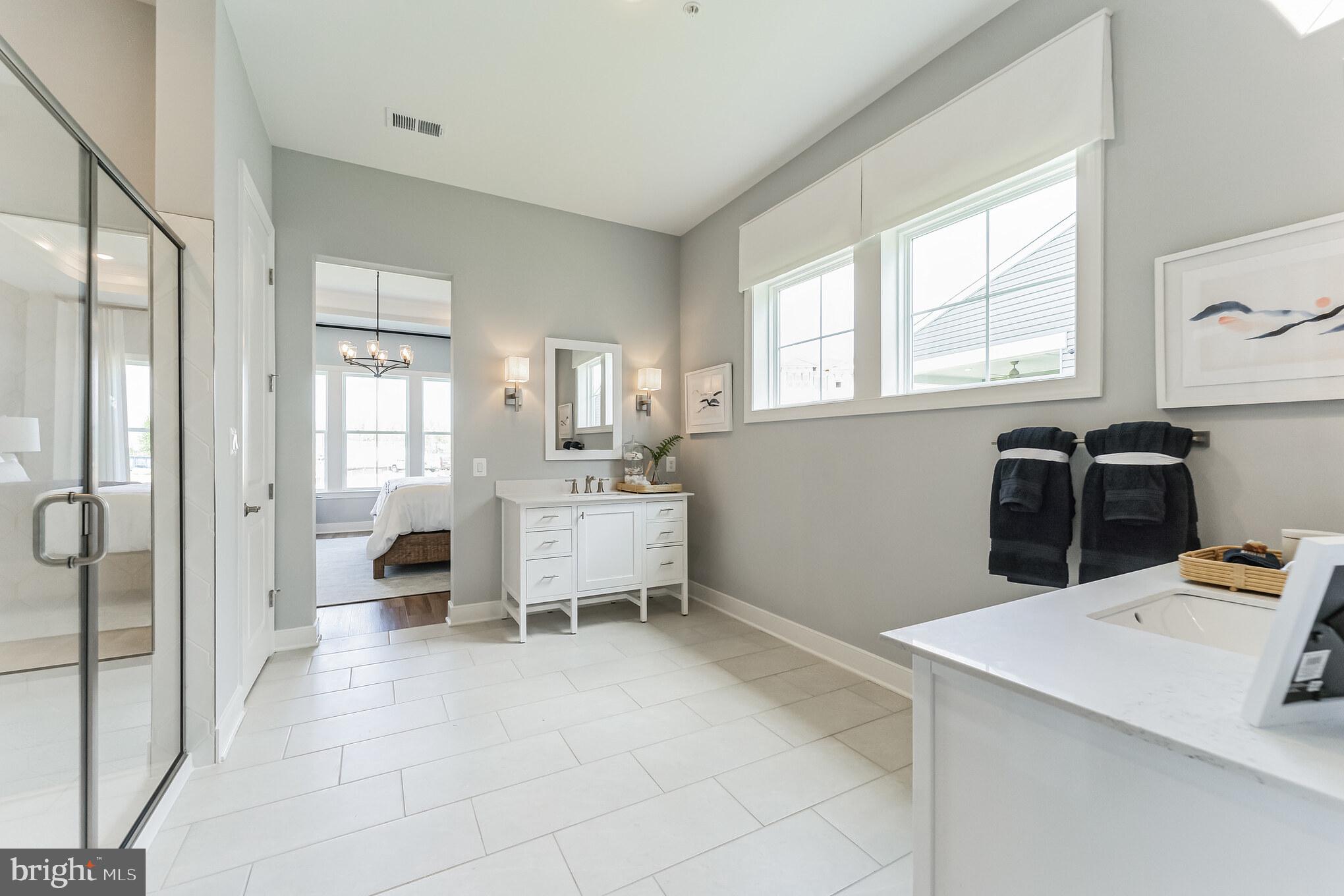 117 Flycatcher Way Stevensville, MD 21666 - Photo 14 of 49 a large white room with windows