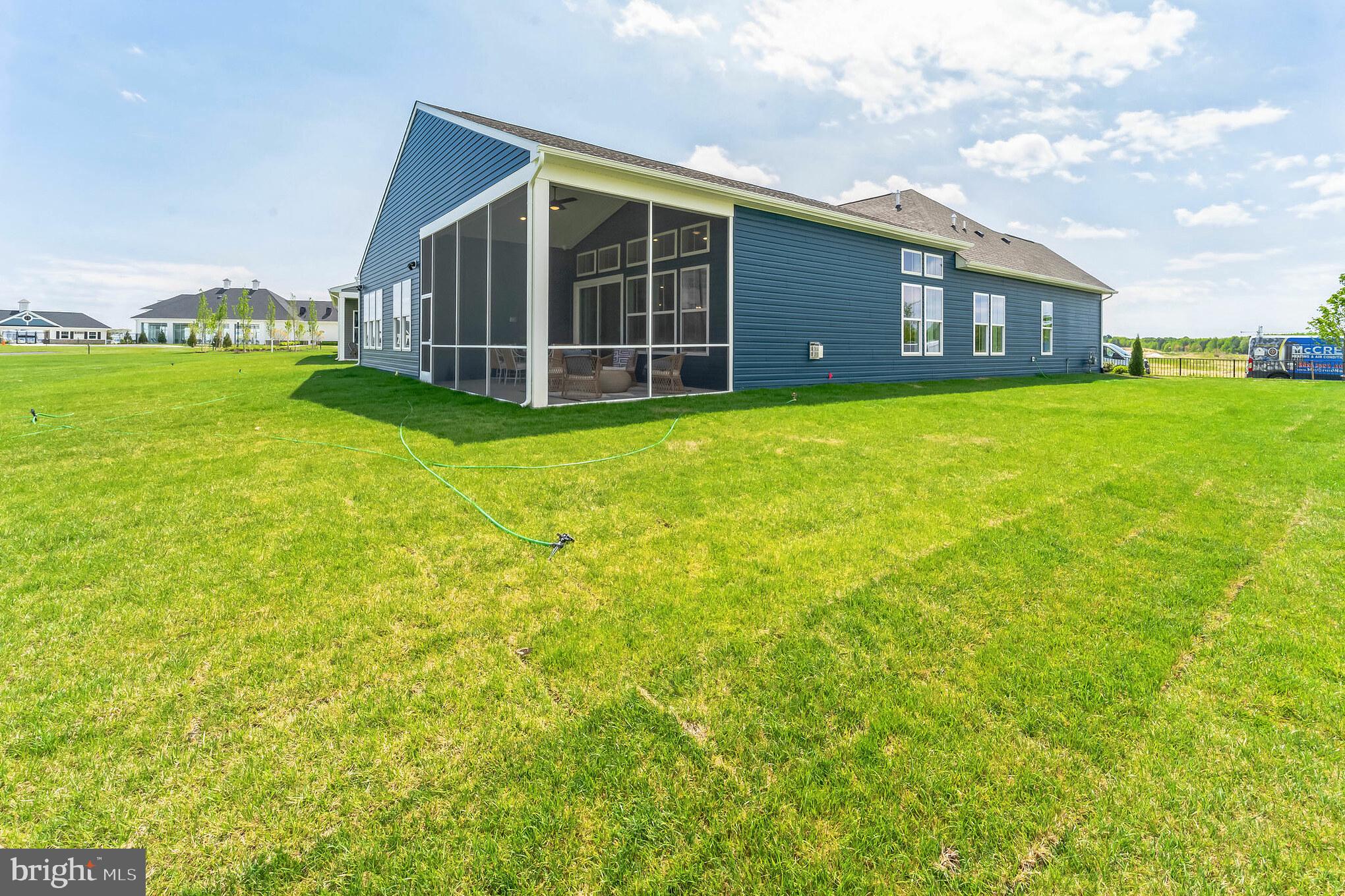 117 Flycatcher Way Stevensville, MD 21666 - Photo 25 of 49 a view of a house with a backyard