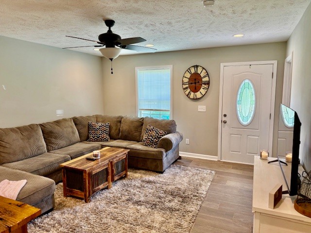 1316 Old Cowan Road Winchester, TN 37398 - Photo 3 of 23 a living room with a couch and a chandelier