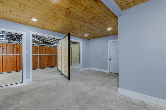 a view of a yard with swimming pool