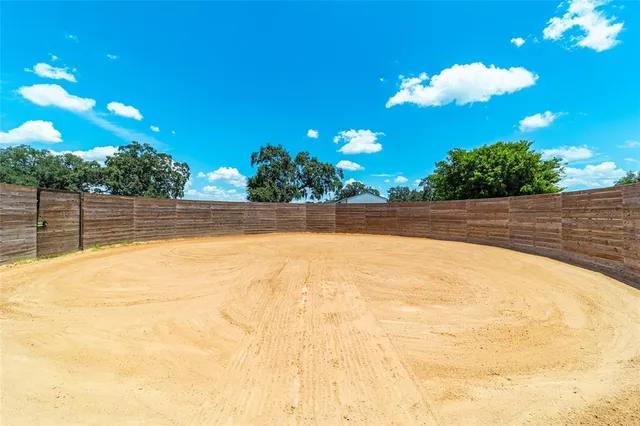 a view of a golf course with a park