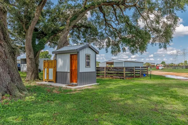 a reading room with furniture and wooden floor