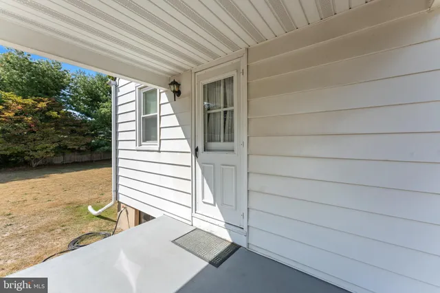 a view of a balcony with door