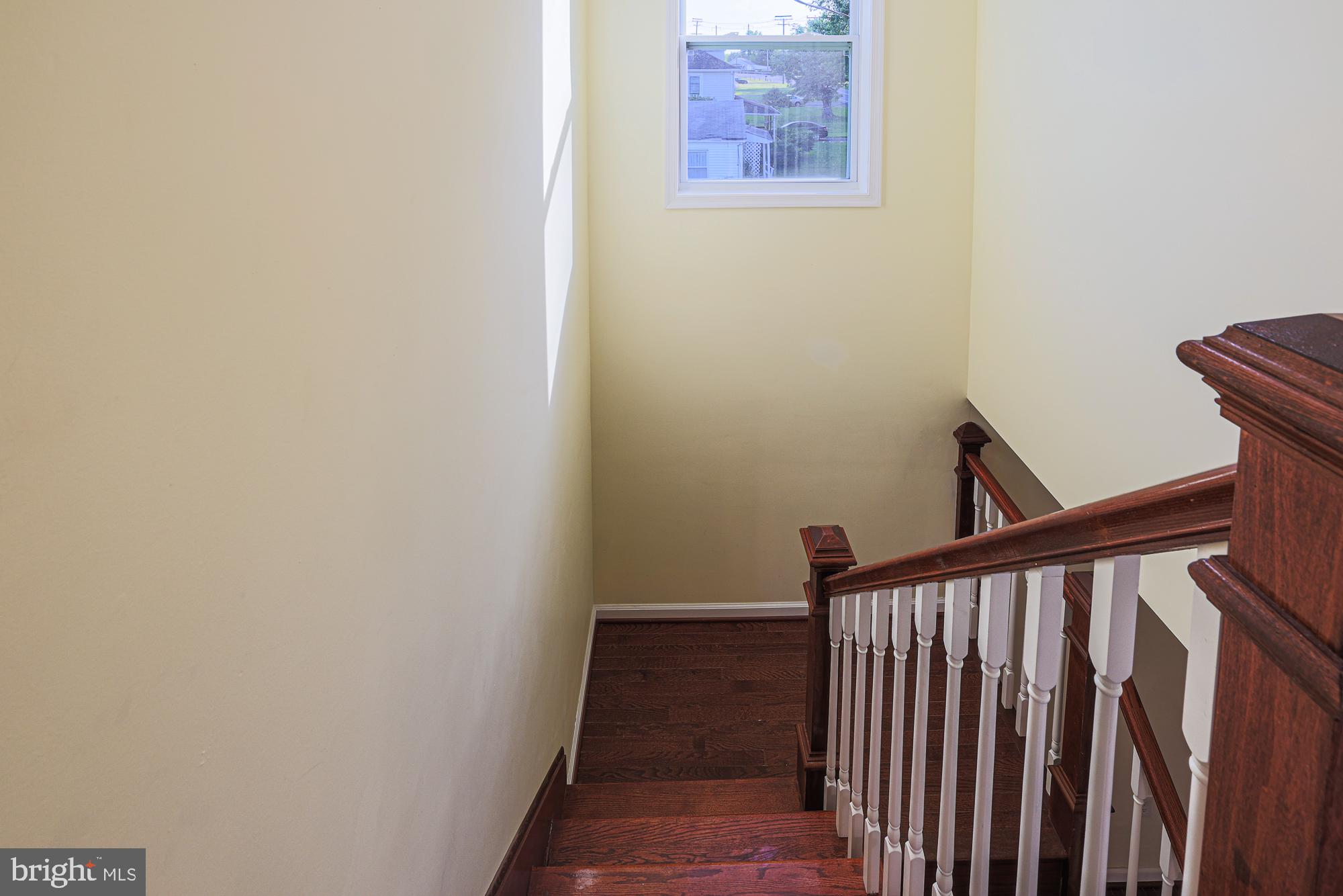 2321 Old Post Road Havre de Grace, MD 21078 - Photo 41 of 60 Inviting staircase bathed in sunlight.