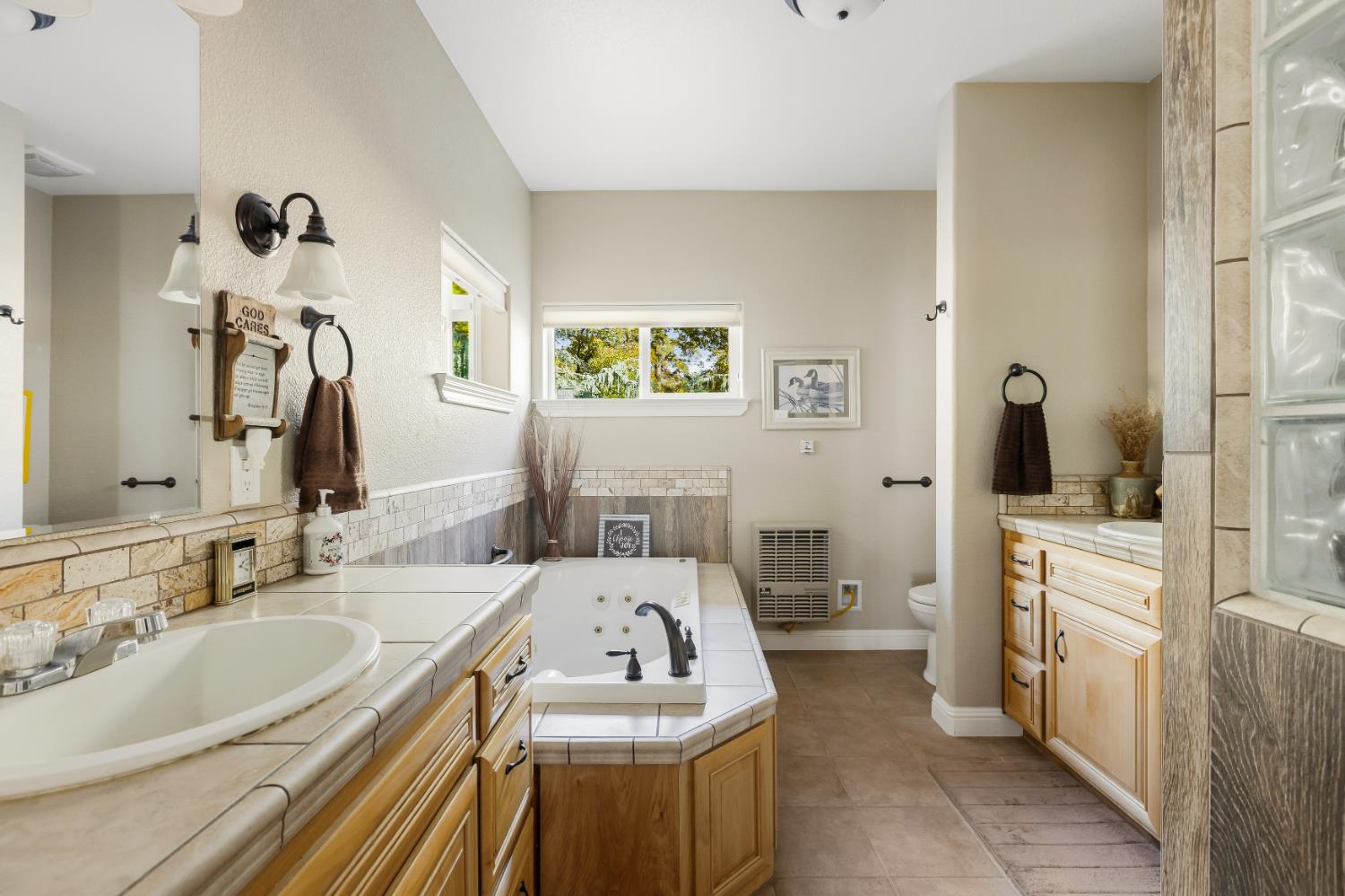 14990 Willow Glen Road Rackerby, CA 95972 - Photo 14 of 81 a bathroom with a sink and a mirror