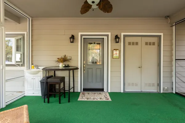 a view of yard along with trees