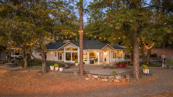 a view of a street with a building in the background