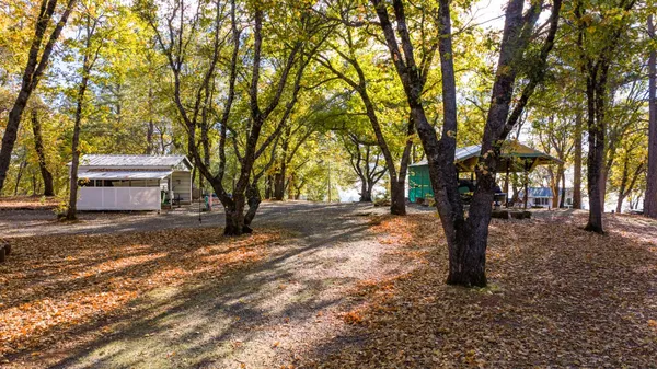 a house with trees in front of it