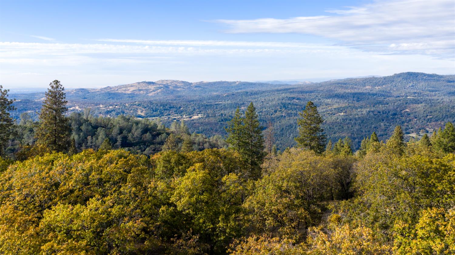 14990 Willow Glen Road Rackerby, CA 95972 - Photo 74 of 81 a view of a city with mountains in the background