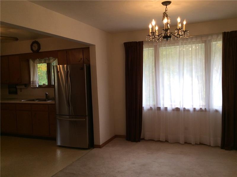 441 Parkwood Road Indiana, PA 15701 - Photo 7 of 14 Dining Room with Wall to Wall Carpet and Large Picture Window