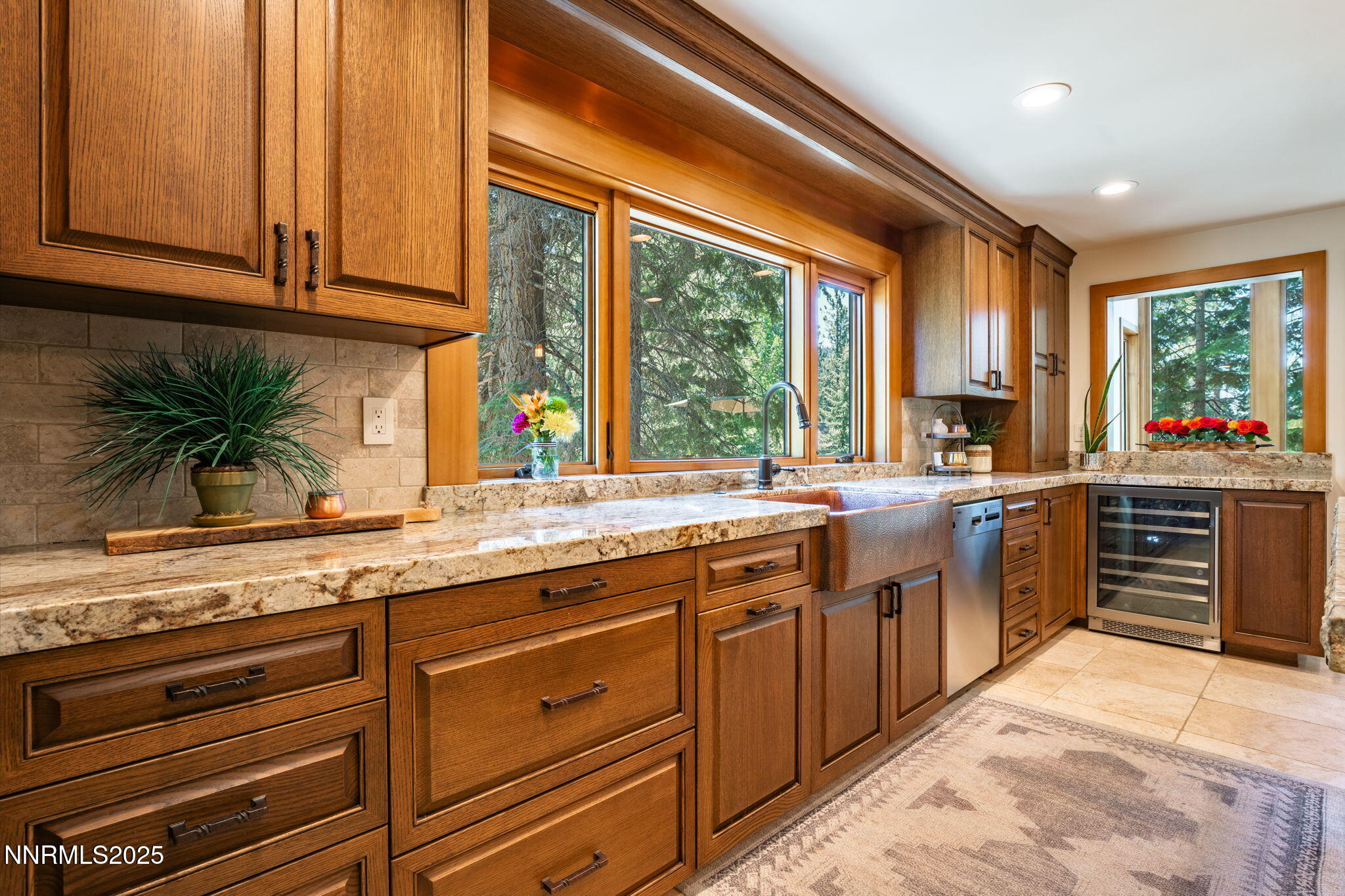 5 Kelly Circle Glenbrook, NV 89413 - Photo 11 of 38 a kitchen with stainless steel appliances granite countertop a stove a sink and a microwave