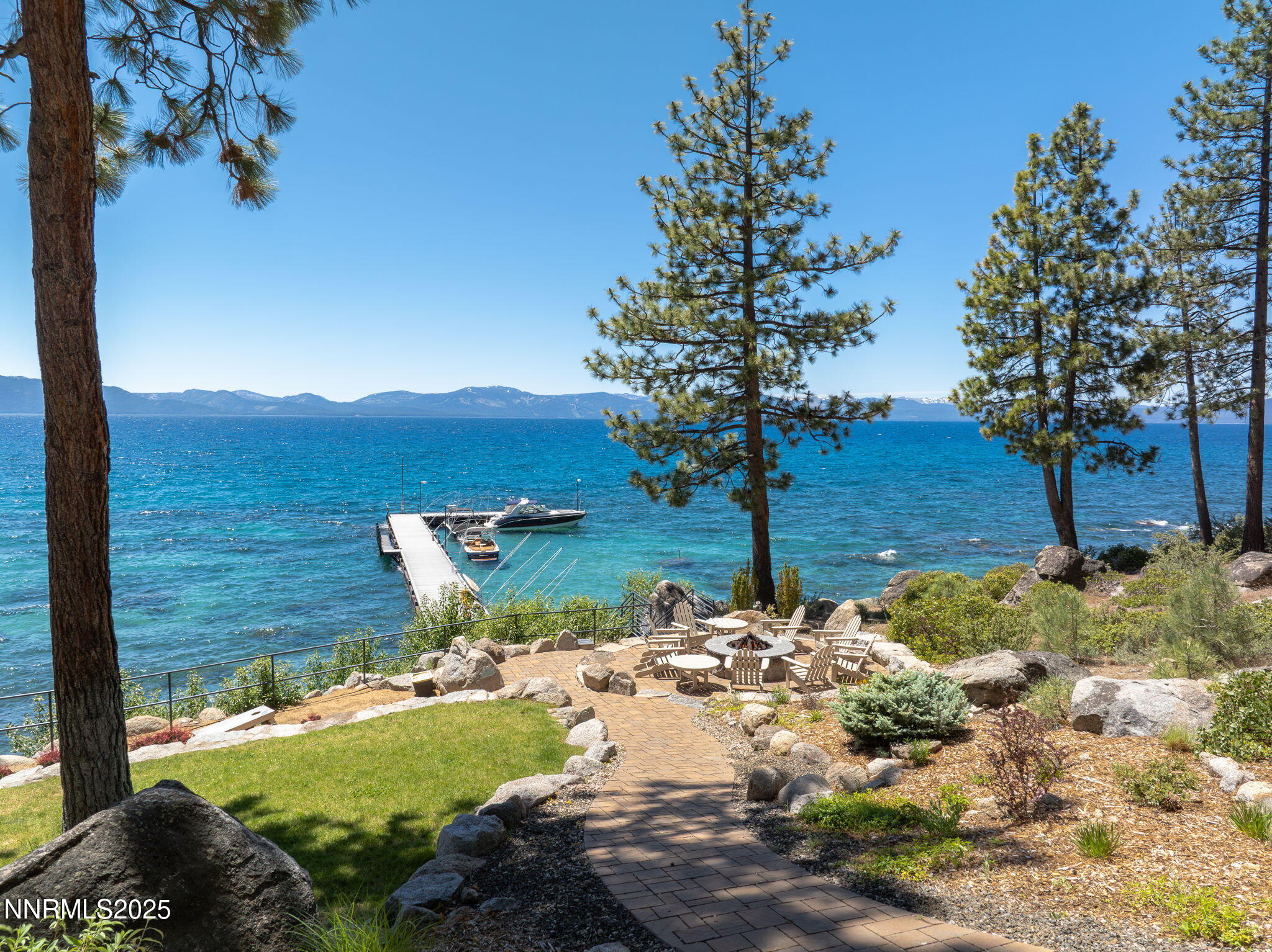 5 Kelly Circle Glenbrook, NV 89413 - Photo 35 of 38 a view of a yard with table and chairs and wooden fence